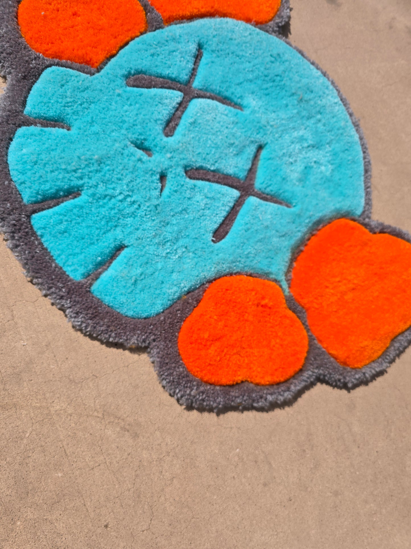 1. Custom Teal & Orange KAWS-Inspired Rug